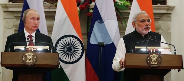 Vladímir Putin,  presidente de Rusia, y  Narendra Modi, primer ministro de India - Sputnik Mundo
