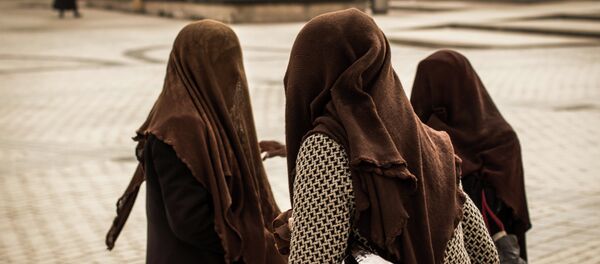 La provincia china de mayoría musulmana prohíbe los velos islámicos La provincia china de mayoría musulmana prohíbe los velos islámicos - Sputnik Mundo