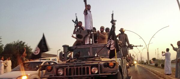 Combatientes del grupo yihadista Estado Islámico (EI) - Sputnik Mundo