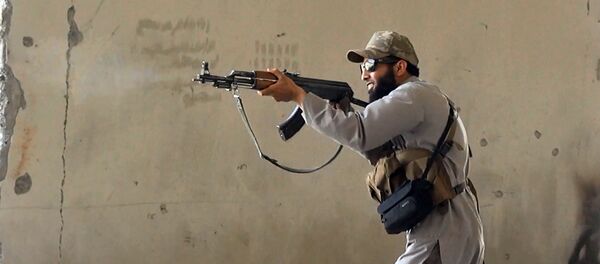 Militante del grupo yihadista Estado Islámico - Sputnik Mundo