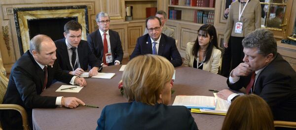 Владимир Путин, президент Украины Петр Порошенко, Ангела Меркель и Франсуа Олланд во время встречи в нормандском формате на полях саммита форума Азия-Европа - Sputnik Mundo