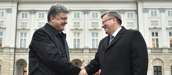 Presidente de Ucrania, Petró Poroshenko y presidente de Polonia, Bronislaw Komorowski - Sputnik Mundo
