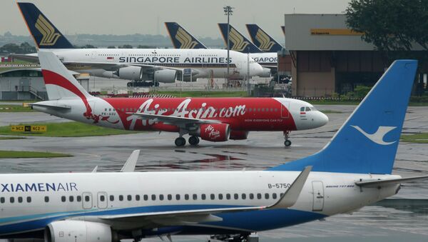 Siguiente vuelo QZ 8501 en el aeropuerto de Changi en Singapur 29 de diciembre Siguiente vuelo QZ 8501 en el aeropuerto de Changi en Singapur 29 de diciembre - Sputnik Mundo