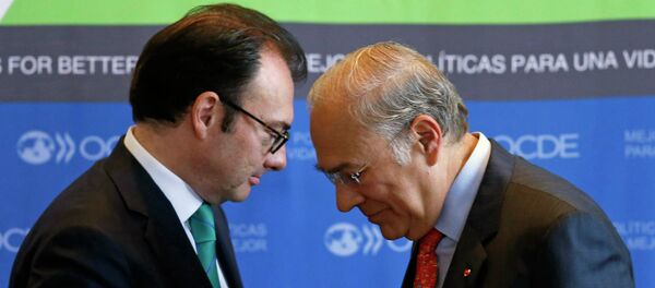 Luis Videgaray Caso y José Ángel Gurría Treviño - Sputnik Mundo