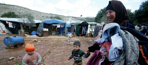 Oposición siria llama a comunidad internacional a ayudar a refugiados que sufren por frío - Sputnik Mundo