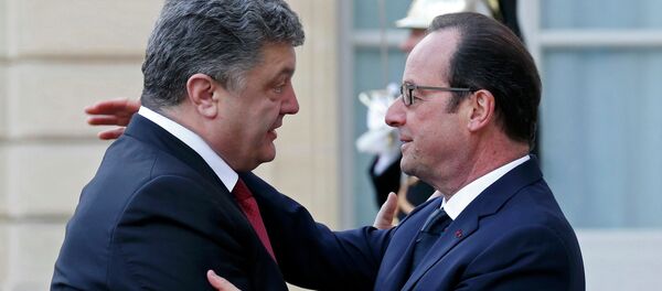 François Hollande, presidente de Francia, con Petró Poroshenko, presidente de Ucrania - Sputnik Mundo