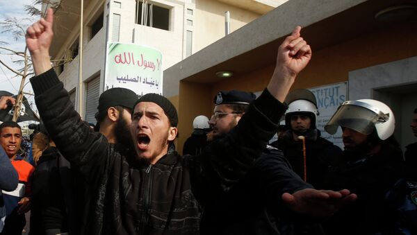 A Palestinian Salafist shouts during a protest against satirical French weekly magazine Charlie Hebdo's cartoons of the Prophet Mohammad, outside the French Cultural Centre in Gaza city January 19, 2015. - Sputnik Mundo