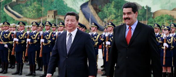 Presidente de China, Xi Jinping y presidente de Venezuela, Nicolás Maduro - Sputnik Mundo