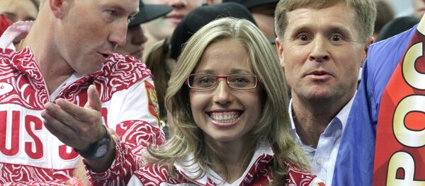 Serguéi Kirdyapkin, Olga Kaniskina y su entrenador Victor Cheguin Serguéi Kirdyapkin, Olga Kaniskina y su entrenador Victor Cheguin - Sputnik Mundo