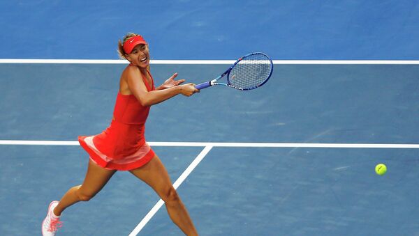 Maria Sharapova of Russia hits a return against Zarina Diyas of Kazakhstan during their women's singles third round match at the Australian Open 2015 tennis tournament in Melbourne January 23, 2015. - Sputnik Mundo