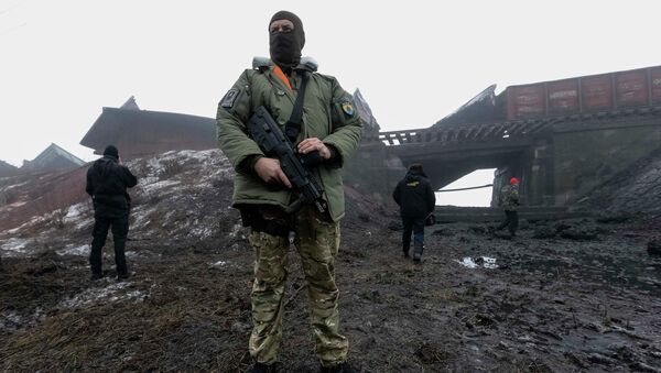 A Ukrainian serviceman - Sputnik Mundo