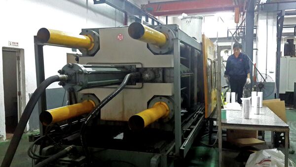 Fábrica en China - Sputnik Mundo