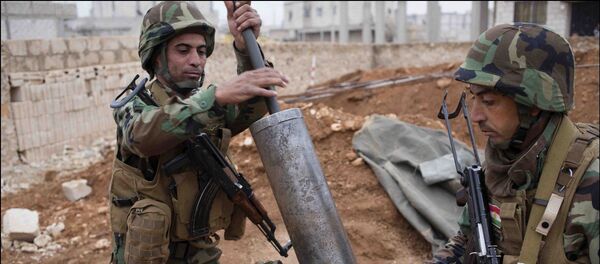 Soldados kurdos durante el combate con fuerzas de EI en Kobani (Archivo) - Sputnik Mundo