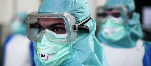 Trabajadores de la Salud que luchan contra ébola Trabajadores de la Salud que luchan contra ébola - Sputnik Mundo