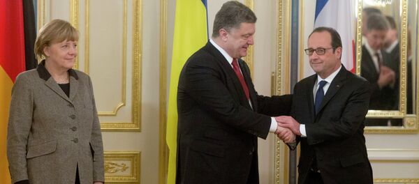 Cancillera de Alemania, Angela Merkel, presidente de Ucrania, Petró Poroshenko y presidente de Francia, François Hollande - Sputnik Mundo
