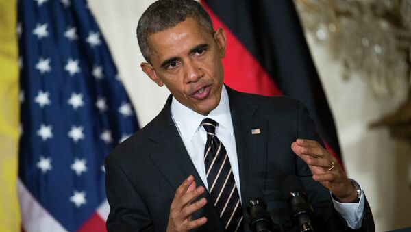 President Barack Obama gestures during a joint news conference with German Chancellor Angela Merkel in the East Room of the White House in Washington, Monday, Feb. 9, 2015 - Sputnik Mundo