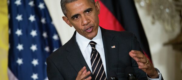 President Barack Obama gestures during a joint news conference with German Chancellor Angela Merkel in the East Room of the White House in Washington, Monday, Feb. 9, 2015 - Sputnik Mundo