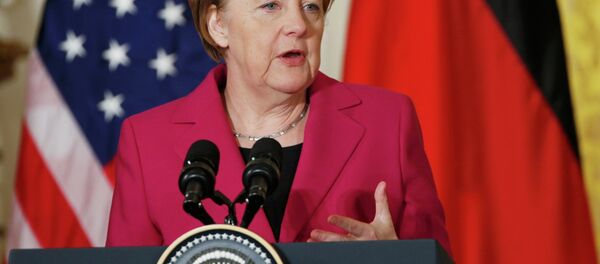 German Chancellor Angela Merkel speaks as she holds a joint news conference with U.S. President Barack Obama in the East Room of the White House in Washington February 9, 2015 - Sputnik Mundo