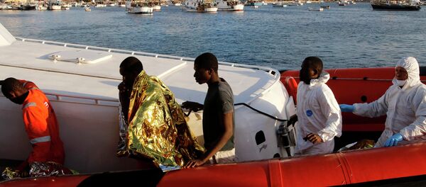 Inmigrantes en Italia (archivo) Inmigrantes en Italia (archivo) - Sputnik Mundo