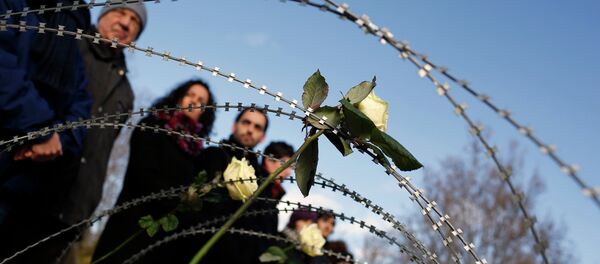 Acto de homenaje y recuerdo a las 15 víctimas fallecidas en Ceuta el 6 de febrero de 2014, mientras intentaban cruzar la frontera de Marruecos a España - Sputnik Mundo