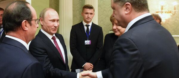 Presidente de Francia, François Hollande, presidente de Rusia, Vladímir Putin, canciller de Alemania, Angela Merkel, y presidente de Ucrania, Petró Poroshenko - Sputnik Mundo