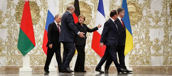 Peace talks in Minsk: Russian President Vladimir Putin, Belarusian President Alexander Lukashenko, German Chancellor Angela Merkel, French President Francois Hollande and Ukrainian President Petro Poroshenko - Sputnik Mundo