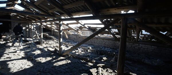 Escuela bombardeada en Donetsk Escuela bombardeada en Donetsk - Sputnik Mundo