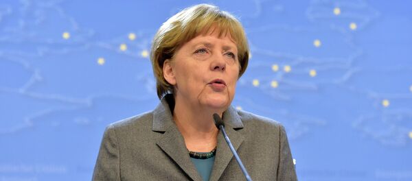 Germany's Chancellor Angela Merkel addresses a news conference after an European Union leaders summit in Brussels February 12, 2015. - Sputnik Mundo