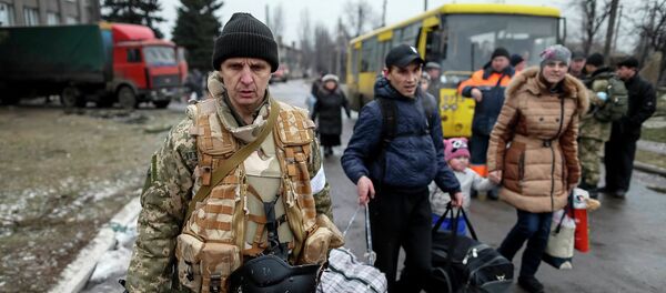 Refugiados ucranianos Refugiados ucranianos - Sputnik Mundo