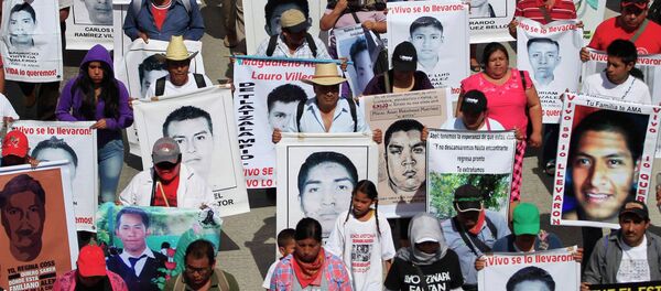 Homenaje a los estudiantes desaparecidos en Ayotzinapa Homenaje a los estudiantes desaparecidos en Ayotzinapa - Sputnik Mundo