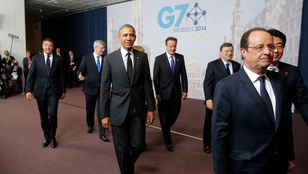 US President Barack Obama, third left, walks with, from left to right: Italian Prime Minister Matteo Renzi; Canadian Prime Minister Stephen Harper; British Prime Minister David Cameron; European Commission President Jose Manuel Barroso; French President Francois Hollande; Japanese Prime Minister Shinzo Abe; after a G7 group photo - Sputnik Mundo