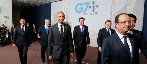 US President Barack Obama, third left, walks with, from left to right: Italian Prime Minister Matteo Renzi; Canadian Prime Minister Stephen Harper; British Prime Minister David Cameron; European Commission President Jose Manuel Barroso; French President Francois Hollande; Japanese Prime Minister Shinzo Abe; after a G7 group photo - Sputnik Mundo