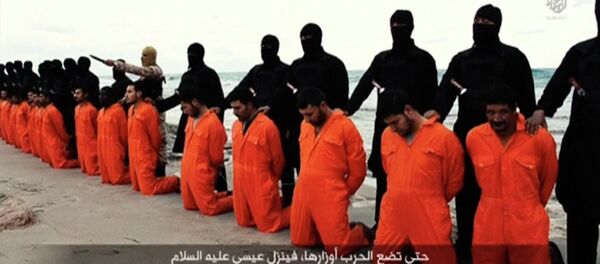 Men in orange jumpsuits purported to be Egyptian Christians held captive by the Islamic State - Sputnik Mundo