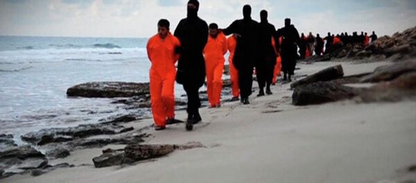 El Estado Islámico publica un video de la ejecución de 21 cristianos egipcios (Archivo) El Estado Islámico publica un video de la ejecución de 21 cristianos egipcios (Archivo) - Sputnik Mundo