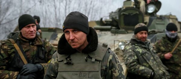 Soldados ucranianos cerca de la ciudad de Debáltsevo Soldados ucranianos cerca de la ciudad de Debáltsevo - Sputnik Mundo