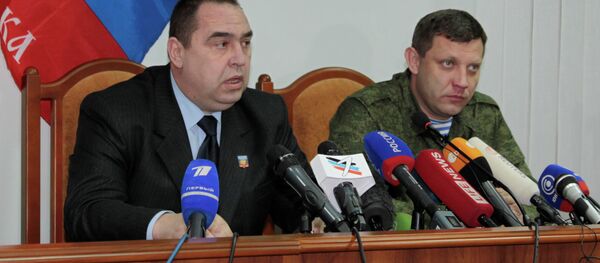 Líder de la autoproclamada República Popular de Lugansk (RPL), Ígor Plotnitski y , líder de la autoproclamadas República Popular de Donetsk (RPD), Alexandr Zajárchenko - Sputnik Mundo