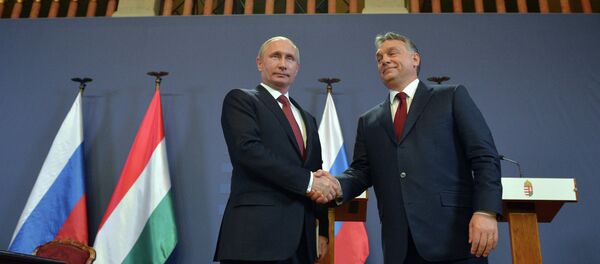 Vladímir Putin, presidente de Rusia, y Víktor Orban, primer ministro de Hungría - Sputnik Mundo