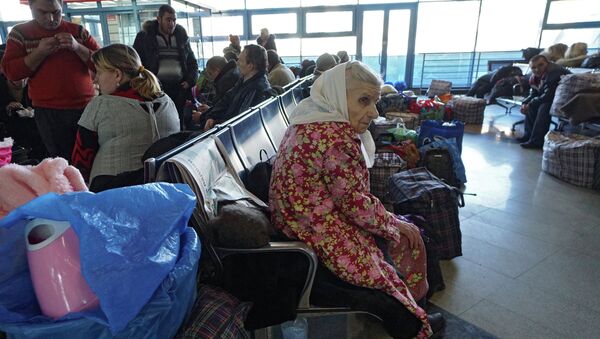 Refugiados ucranianos Refugiados ucranianos - Sputnik Mundo