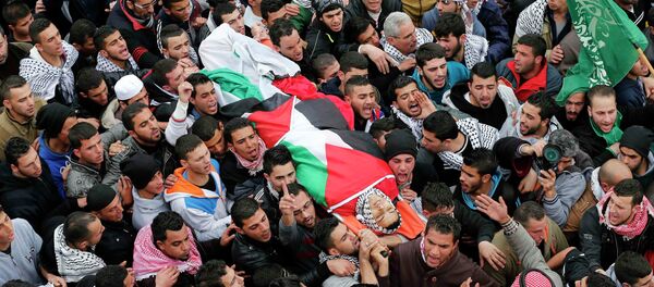 Funerales de Jihad Shehada al Jaafari, de 19 años, matado por los fuerzas israelís Funerales de Jihad Shehada al Jaafari, de 19 años, matado por los fuerzas israelís - Sputnik Mundo