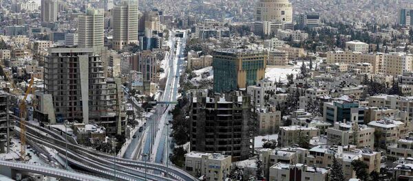 A general view shows the city of Amman during a heavy snowstorm February 20, 2015. - Sputnik Mundo