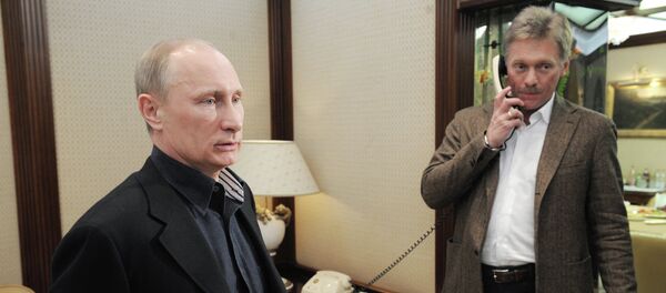 Кандидат в президенты РФ В. Путин посещает избирательный штаб - Sputnik Mundo