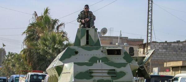 Combatiente de YPG - Sputnik Mundo