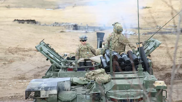Militares de Canadá y EEUU durante los ejercicios en Letonia - Sputnik Mundo