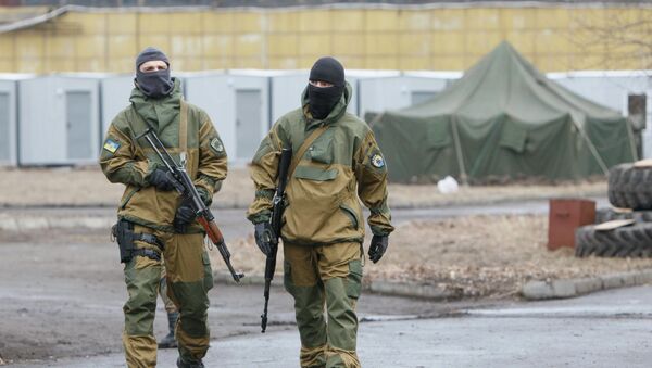 Members of the Ukrainian Interior Ministry's Azov battalion are pictured at a camp of the battalion in Kiev March 1, 2015 - Sputnik Mundo