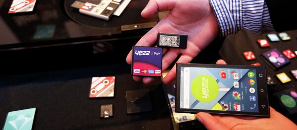 Prototype modular parts created by Yezz Mobile for Project Ara, Google's modular smartphone project, are shown during the Mobile World Congress in Barcelona March 1, 2015 Prototype modular parts created by Yezz Mobile for Project Ara, Google's modular smartphone project, are shown during the Mobile World Congress in Barcelona March 1, 2015 - Sputnik Mundo