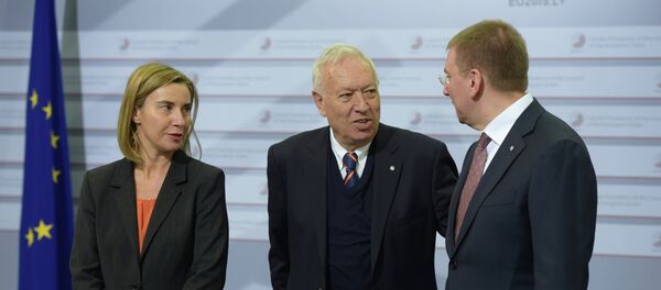 Fedreica Mogherini, José Manuel García-Margallo y Edgars Rinkevics - Sputnik Mundo