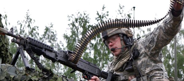 Un militar de la OTAN en Lituania Un militar de la OTAN en Lituania - Sputnik Mundo