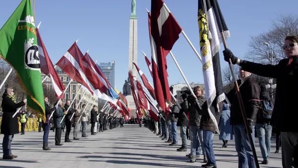 Marcha de los ex legionarios de las Waffen SS en Riga (archivo de 2013) - Sputnik Mundo
