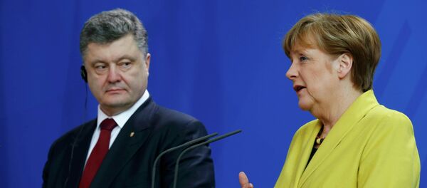 Presidente de Ucrania, Petró Poroshenko y canciller de Alemania, Angela Merkel - Sputnik Mundo
