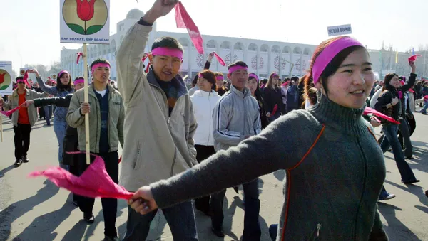 Kyrgyz youth march on the central square of Bishkek, 24 March 2006, marking the first anniversary of the so-called tulip revolution